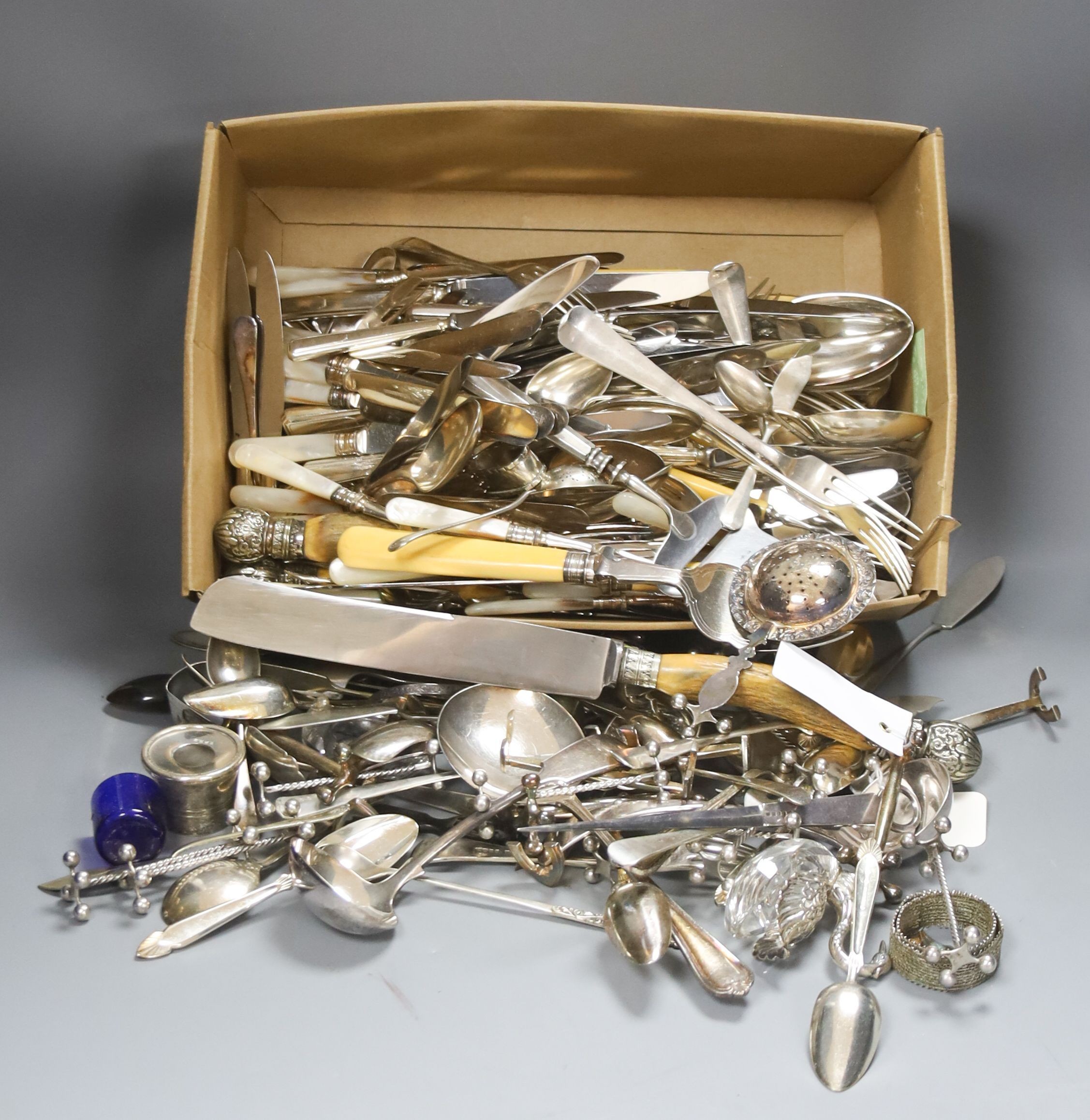 A quantity of silver plated flatware to include three piece stag horn handled ...... silver and mother of pearl handled dessert eaters